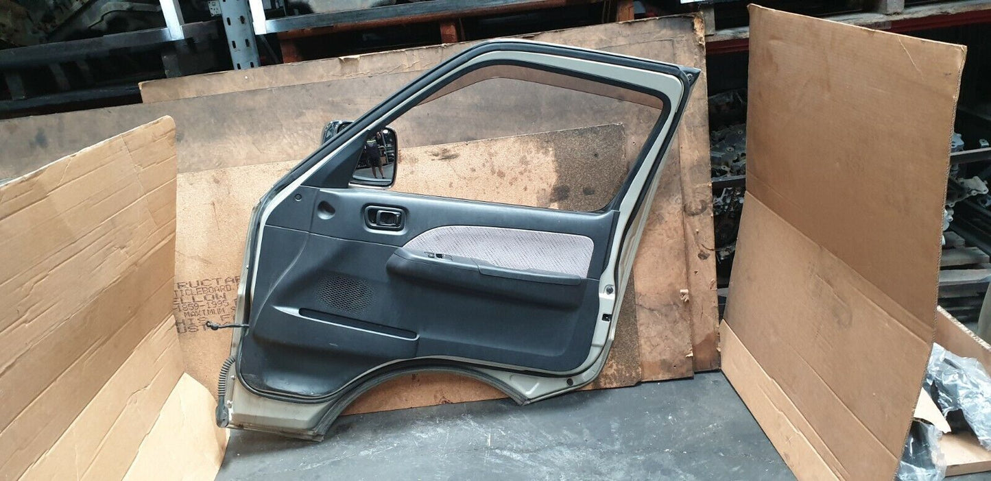 NISSAN URVAN SGE25 2001-2012 FRONT RIGHT DOOR WITH MIRROR