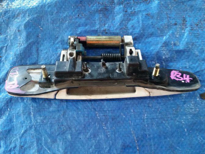 NISSAN SKYLINE R34 SEDAN REAR LEFT OUTER DOOR HANDLE RLHS WHITE