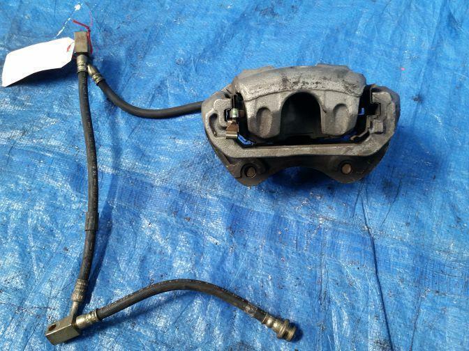 NISSAN SKYLINE CPV35 FRONT RIGHT BRAKE CALIPER 06/01-06/07