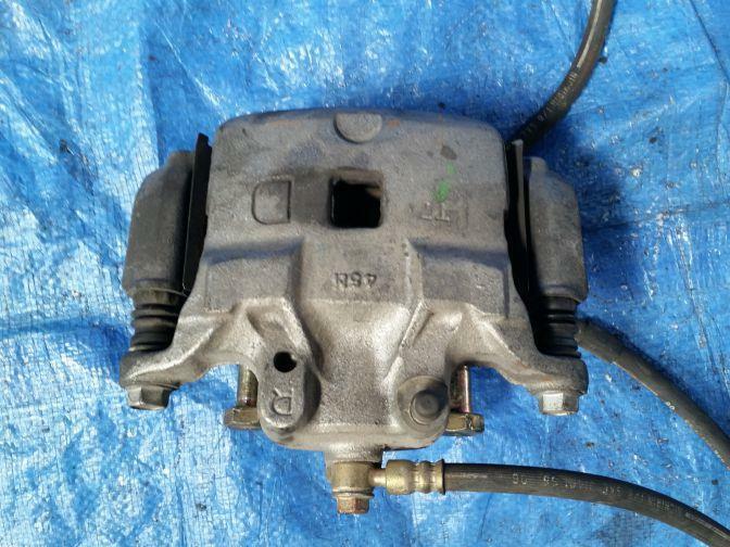 NISSAN SKYLINE CPV35 FRONT RIGHT BRAKE CALIPER 06/01-06/07