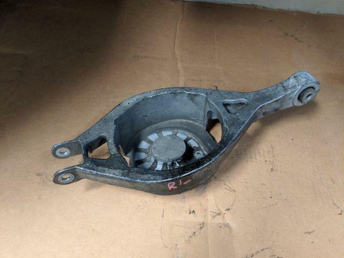 NISSAN STAGEA M35 REAR LEFT SPRING CARRIER 2001-2007