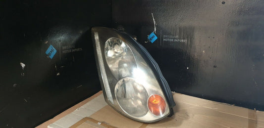 NISSAN SKYLINE COUPE CPV35 RIGHTHAND HID HEADLIGHT